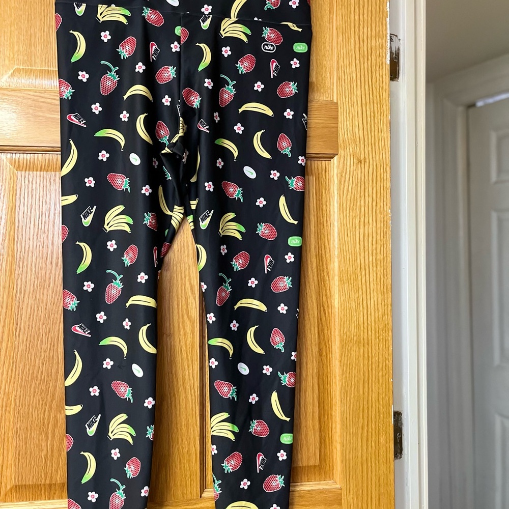 Nike Black and Yellow Leggings with Playful Fruit Print